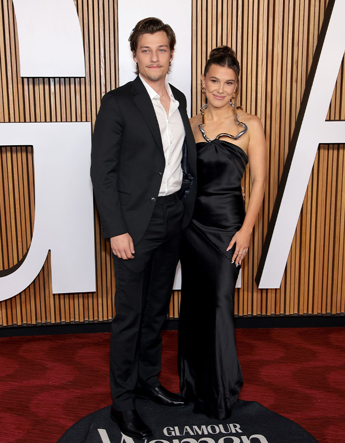 Millie Bobby Brown’s Arm Injury Fuels Fan Theories About Jake Bongiovi’s ‘Control’