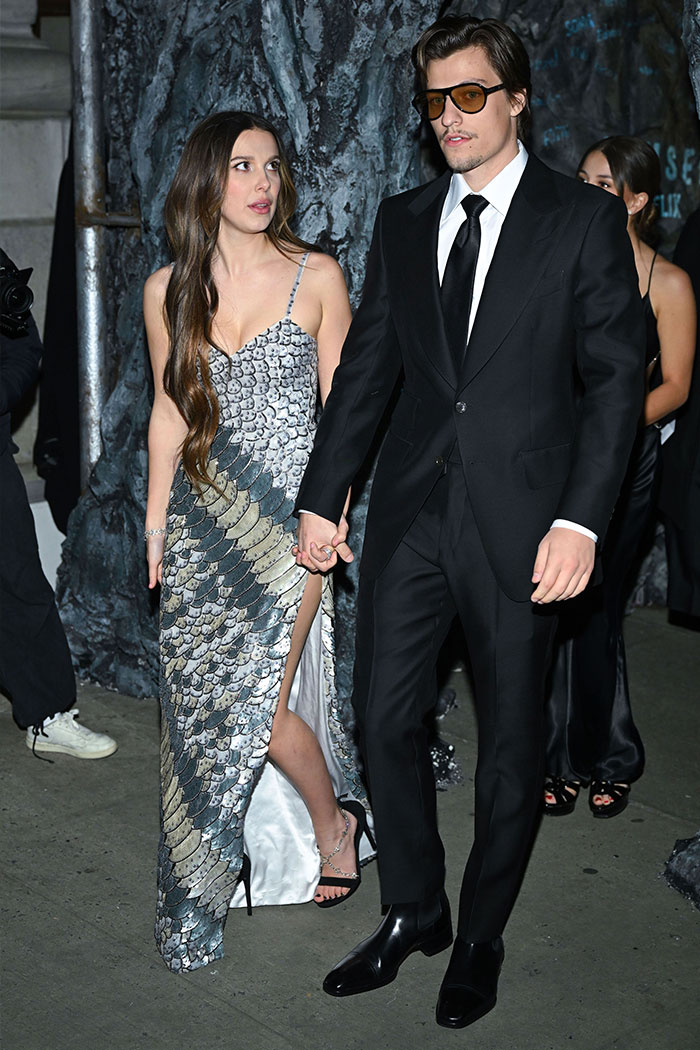 Millie Bobby Brown’s Arm Injury Fuels Fan Theories About Jake Bongiovi’s ‘Control’